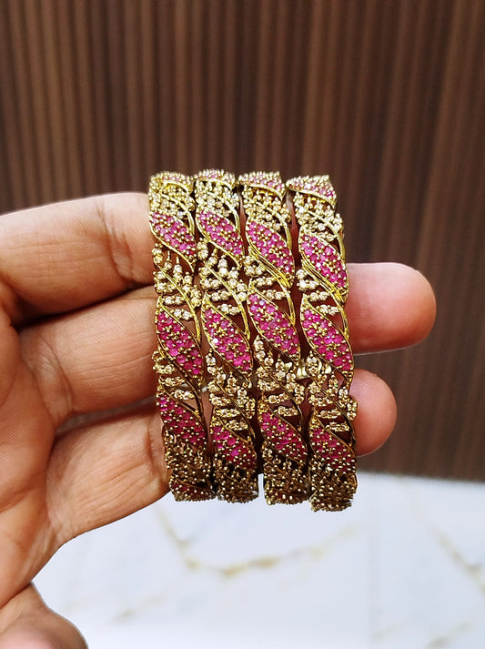 Indian A.D Zarcon 12-Piece Bangles Set β Premium Shine & Elegant Finish